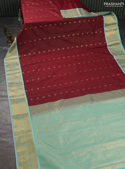 Semi kanchipuram silk saree maroon and teal blue shade with allover zari weaves & buttas and zari woven korvai border