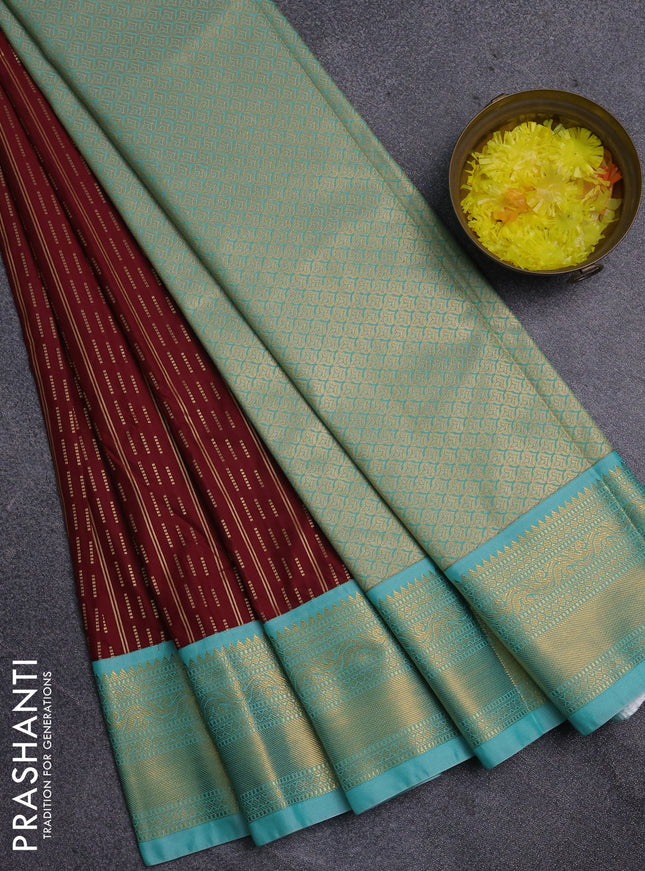 Semi kanchipuram silk saree maroon and teal blue with allover zari weaves and zari woven korvai border