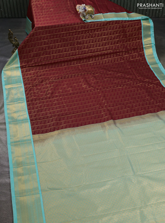 Semi kanchipuram silk saree maroon and teal blue with allover zari weaves and zari woven korvai border