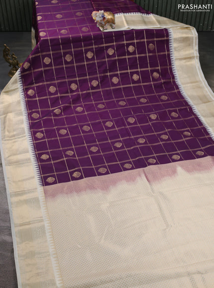 Semi kanchipuram silk saree purple and cream with allover small zari checks & buttas and zari woven korvai border
