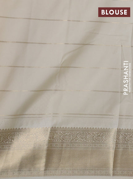 Semi kanchipuram silk saree purple and cream with allover small zari checks & buttas and zari woven korvai border