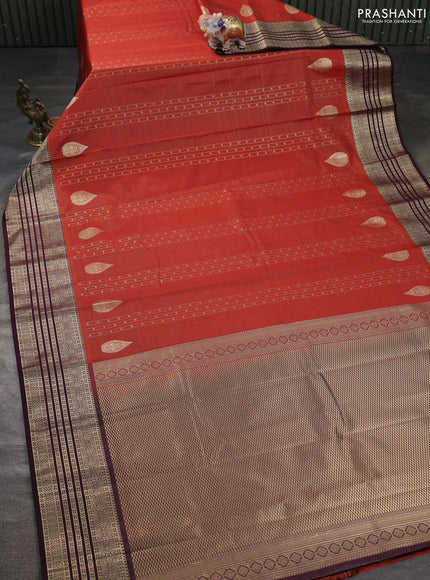 Semi kanchipuram silk saree rustic orange and wine shade with allover zari weaves & buttas and zari woven korvai border