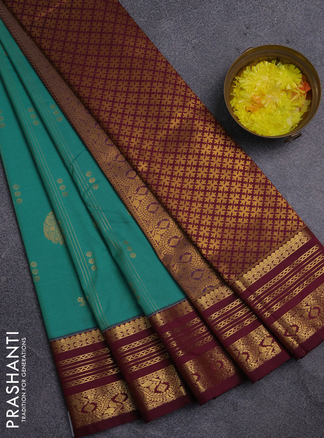 Semi kanchipuram silk saree teal green shade and wine shade with allover zari weaves & buttas and zari woven border