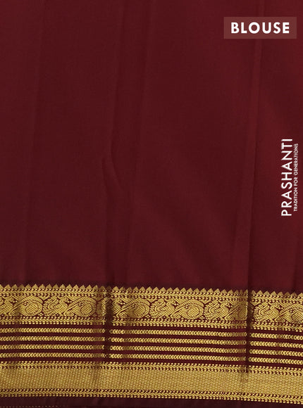 Semi kanchipuram silk saree pista green and maroon with allover zari woven buttas and zari woven korvai border