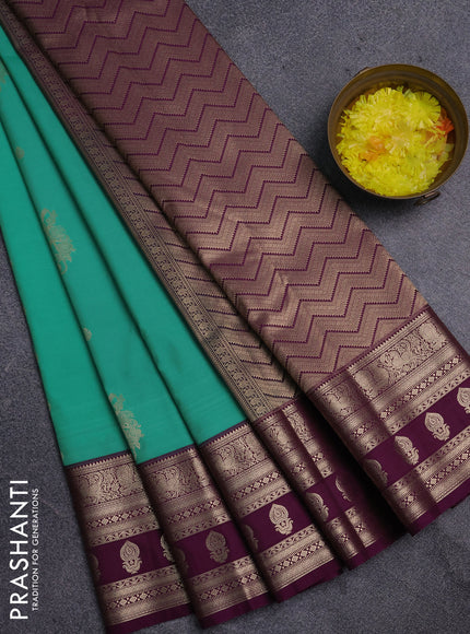 Semi kanchipuram silk saree teal blue and purple with zari woven buttas and zari woven border
