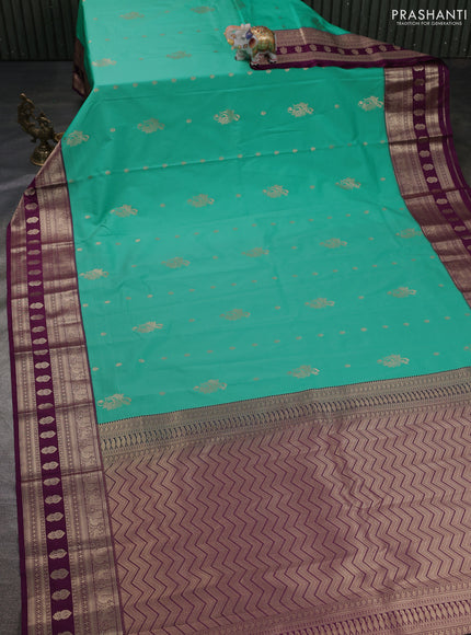Semi kanchipuram silk saree teal blue and purple with zari woven buttas and zari woven border