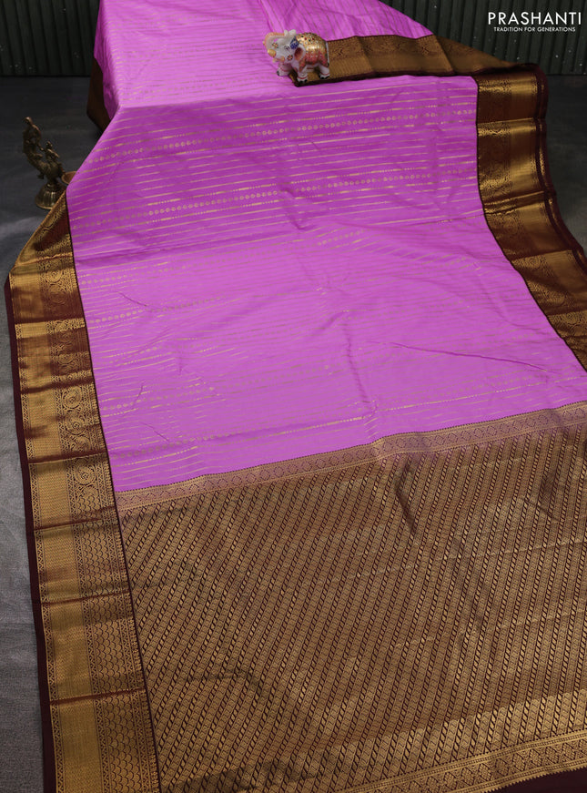 Semi kanchipuram silk saree lavender and coffee brown with allover zari weaves and zari woven korvai border