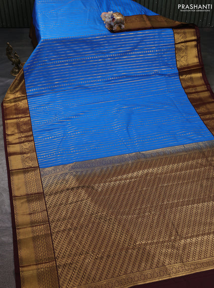 Semi kanchipuram silk saree cs blue and coffee brown with allover zari weaves and zari woven korvai border