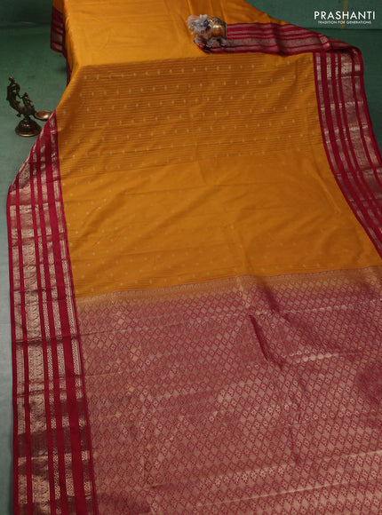 Semi kanchipuram silk saree mango yellow and pink with allover zari weaves & buttas and zari woven korvai border