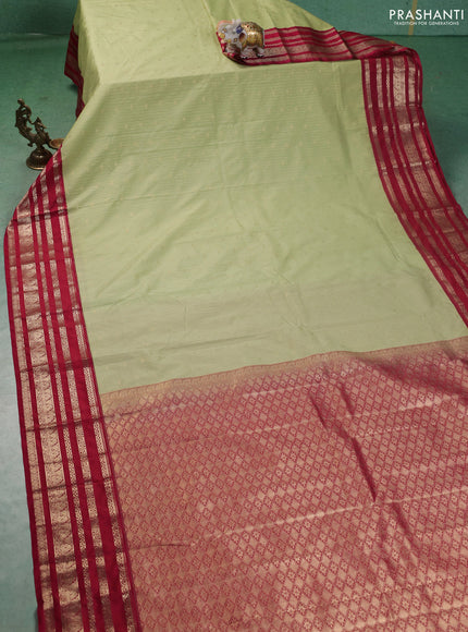 Semi kanchipuram silk saree pista green and pink with allover zari weaves & buttas and zari woven korvai border