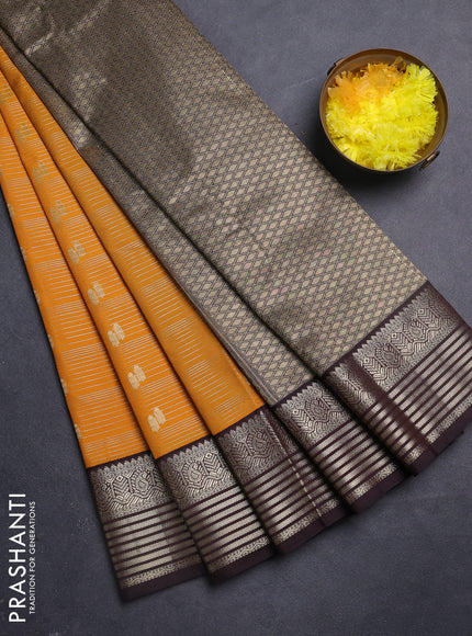 Semi kanchipuram silk saree mango yellow and coffee brown with allover zari weaves & buttas and zari woven korvai border