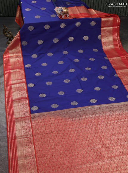 Semi kanchipuram silk saree blue and orange with zari woven buttas and long zari woven korvai border