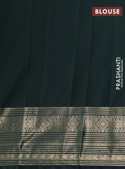 Semi kanchipuram silk saree cream and bottle green with zari woven buttas and long zari woven border