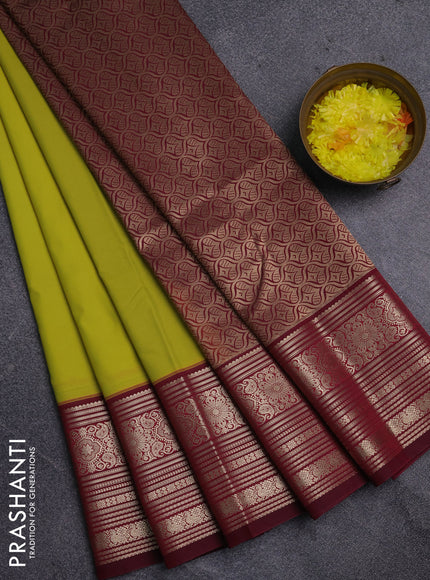 Semi kanchipuram silk saree lime green and dark magenta pink with zari woven buttas and long zari woven border