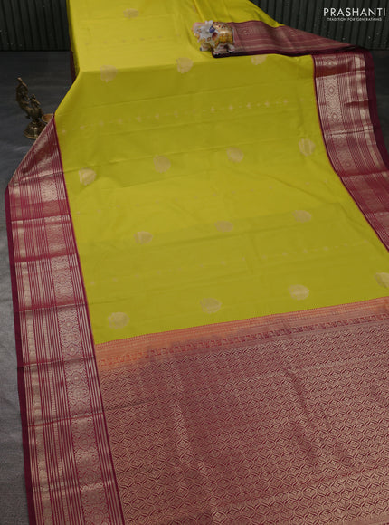 Semi kanchipuram silk saree lime green and dark magenta pink with zari woven buttas and long zari woven border