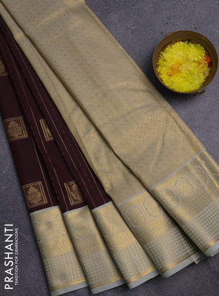 Semi kanchipuram silk saree coffee brown and pastel grey with allover zari weaves & buttas and zari woven korvai border