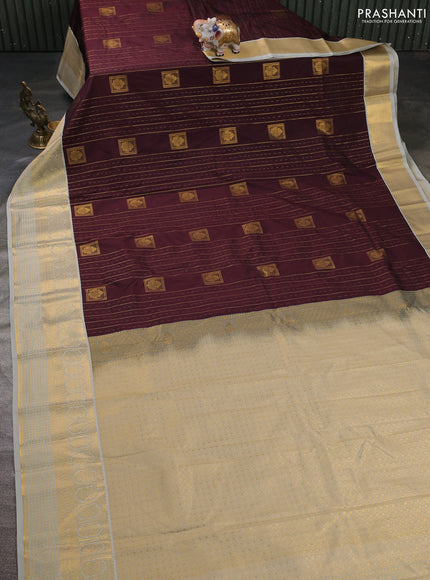 Semi kanchipuram silk saree coffee brown and pastel grey with allover zari weaves & buttas and zari woven korvai border