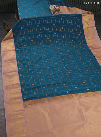 Semi kanchipuram silk saree peacock blue and pastel pink with allover zari checks & buttas and zari woven korvai border