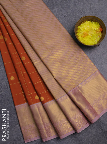 Semi kanchipuram silk saree dark mustard and pastel pink with allover zari checks & buttas and zari woven korvai border