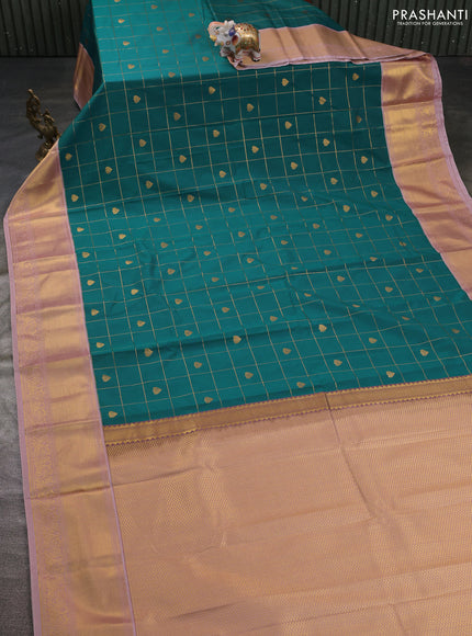 Semi kanchipuram silk saree peacock green shade and pastel pink with allover zari checks & buttas and zari woven korvai border
