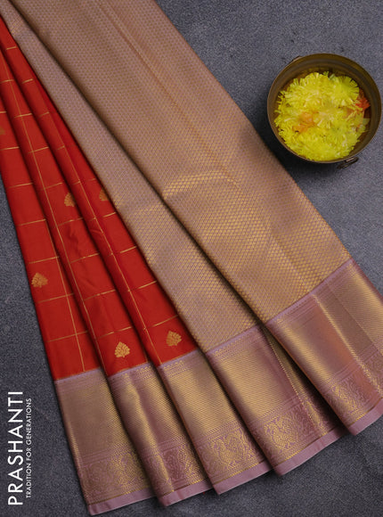 Semi kanchipuram silk saree orange and pastel pink with allover zari checks & buttas and zari woven korvai border
