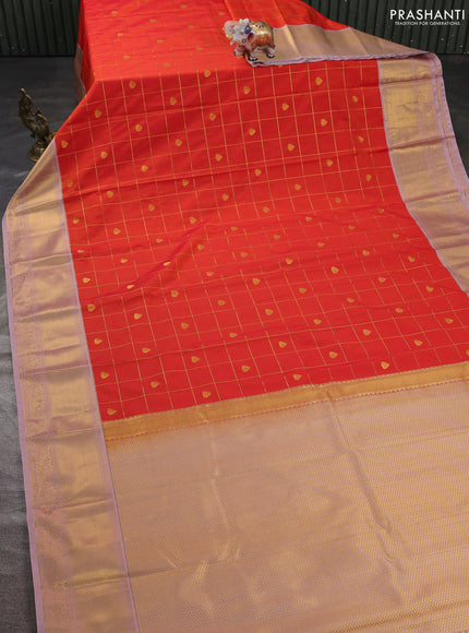 Semi kanchipuram silk saree orange and pastel pink with allover zari checks & buttas and zari woven korvai border