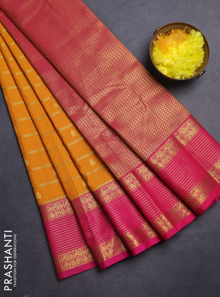 Semi kanchipuram silk saree mustard yellow and pink with allover zari weaves & buttas and zari woven korvai border