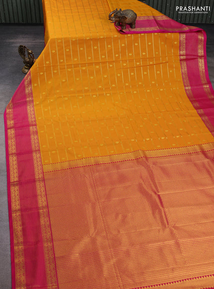 Semi kanchipuram silk saree mustard yellow and pink with allover zari weaves & buttas and zari woven korvai border