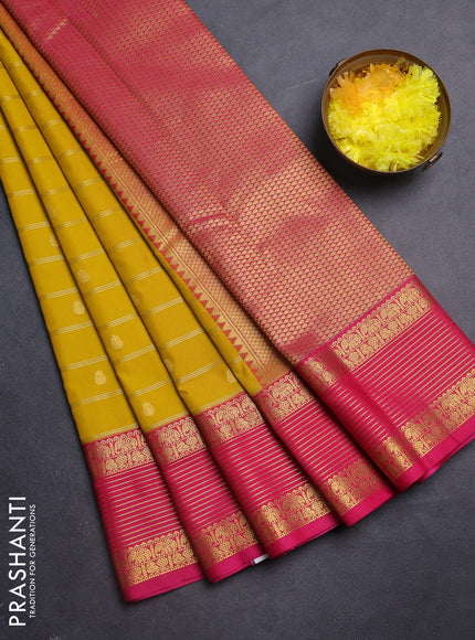Semi kanchipuram silk saree mustard yellow and pink with allover zari weaves & buttas and zari woven korvai border