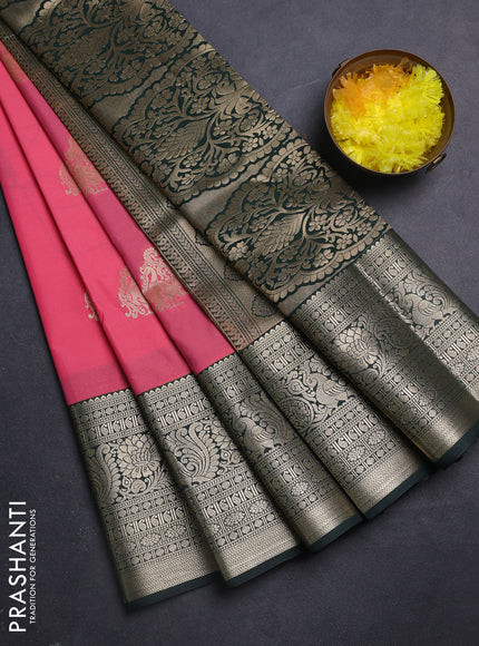 Semi kanchipuram silk saree peach pink and bottle green with zari woven buttas and long zari woven korvai border