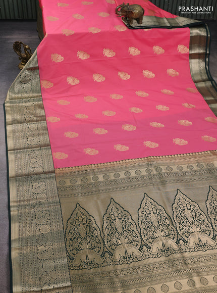 Semi kanchipuram silk saree peach pink and bottle green with zari woven buttas and long zari woven korvai border