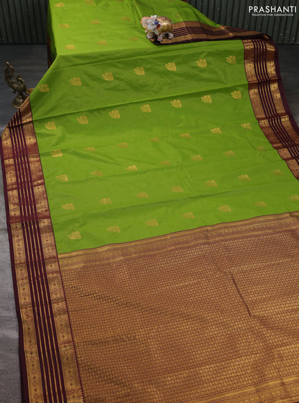 Semi kanchipuram silk saree green and deep maroon with allover zari weaves & buttas and zari woven korvai border