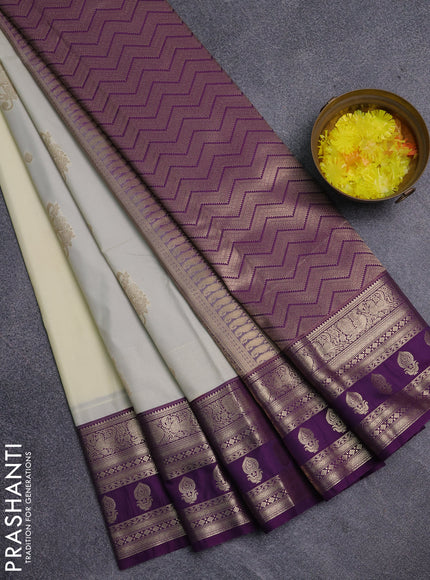 Semi kanchipuram silk saree cream and purple with zari woven buttas and zari woven korvai border