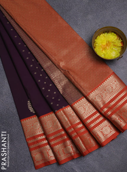 Semi kanchipuram silk saree wine shade and orange with allover zari wwoven buttas and long zari woven korvai border
