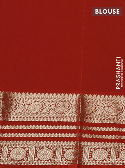 Semi kanchipuram silk saree wine shade and orange with allover zari wwoven buttas and long zari woven korvai border
