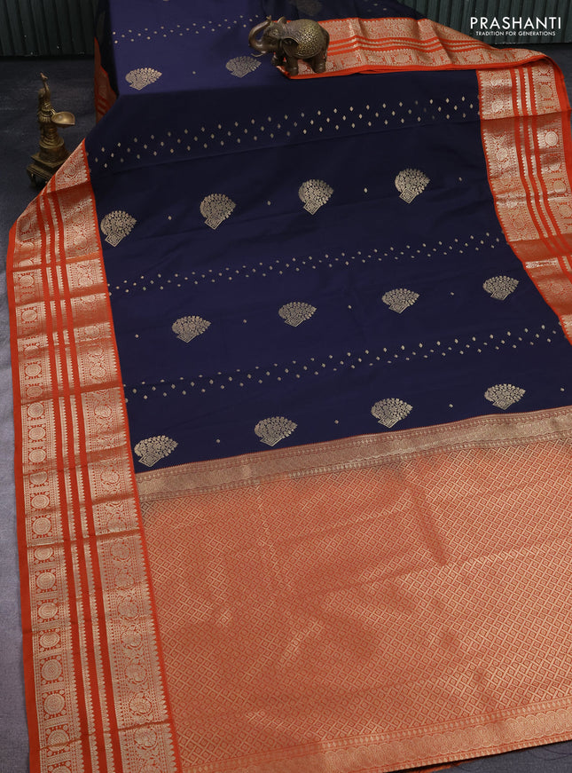 Semi kanchipuram silk saree navy blue and orange with allover zari wwoven buttas and long zari woven korvai border