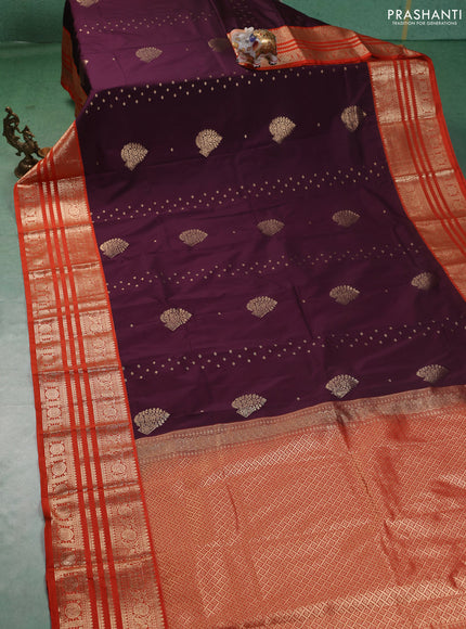 Semi kanchipuram silk saree wine shade and orange with allover zari wwoven buttas and long zari woven korvai border