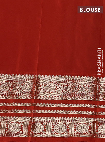 Semi kanchipuram silk saree wine shade and orange with allover zari wwoven buttas and long zari woven korvai border