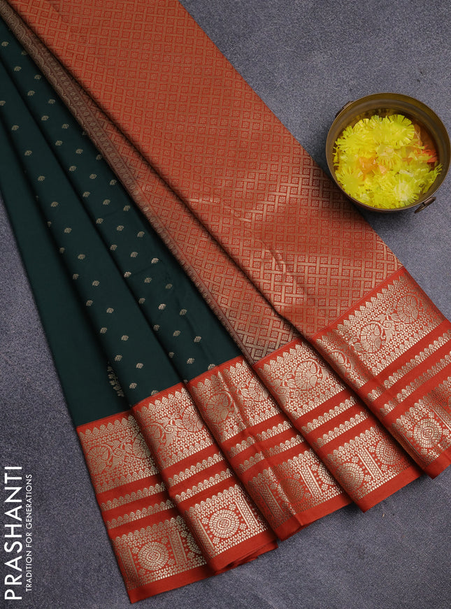 Semi kanchipuram silk saree bottle green and orange with allover zari wwoven buttas and long zari woven korvai border
