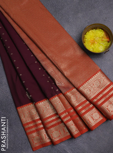 Semi kanchipuram silk saree wine shade and orange with allover zari wwoven buttas and long zari woven korvai border