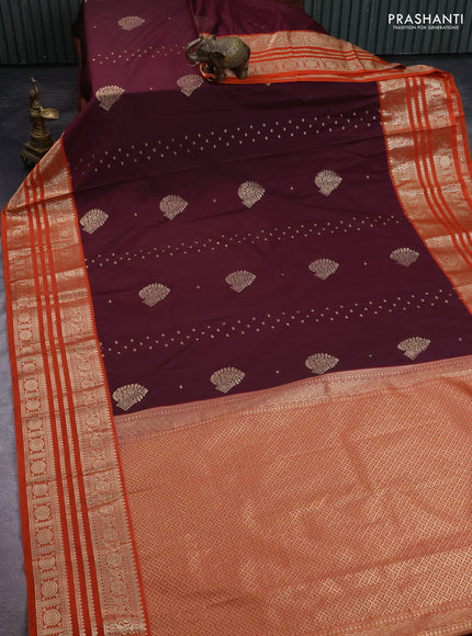 Semi kanchipuram silk saree wine shade and orange with allover zari wwoven buttas and long zari woven korvai border
