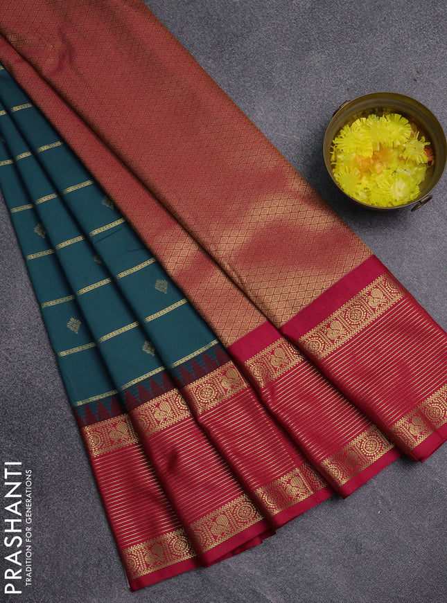 Semi kanchipuram silk saree peacock blue and pink with allover zari weaves & buttas and temple design zari woven korvai border