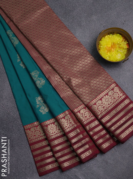 Semi kanchipuram silk saree dual shade of teal blue and wine shade with zari woven buttas and long zari woven korvai border
