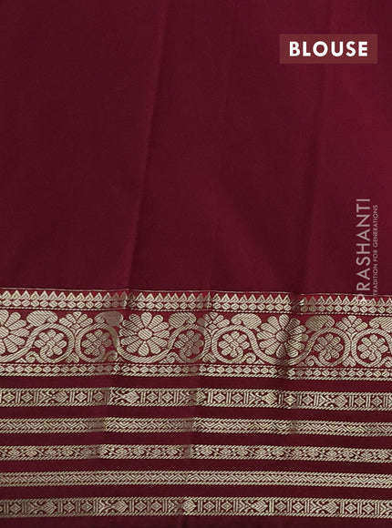 Semi kanchipuram silk saree dual shade of teal blue and wine shade with zari woven buttas and long zari woven korvai border