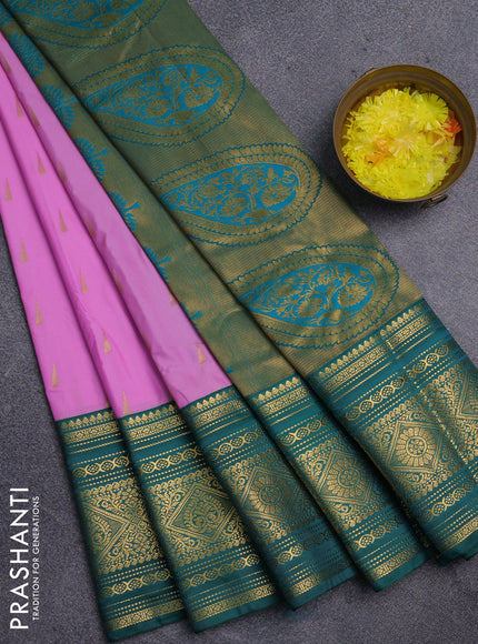 Semi kanchipuram silk saree lotus pink and teal green with zari woven temple buttas and long zari woven korvai border