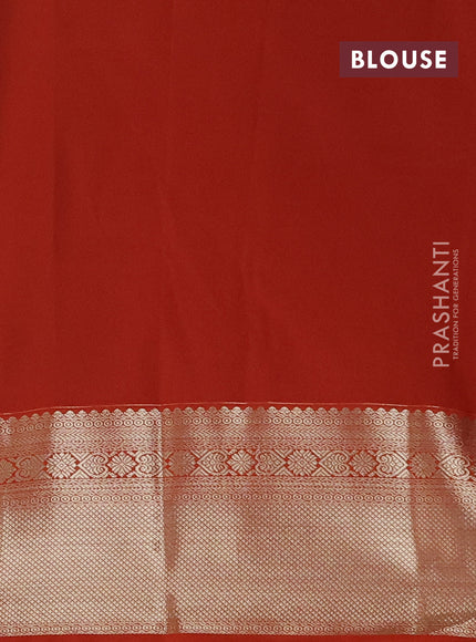 Semi kanchipuram silk saree navy blue and orange with allover self emboss & zari buttas and long zari woven korvai border