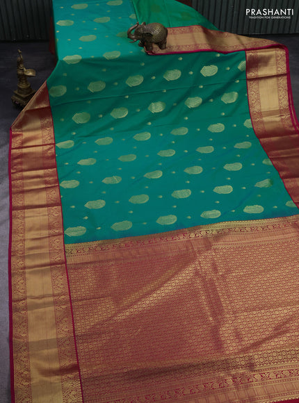 Semi kanchipuram silk saree green and pink with zari woven buttas and long zari woven korvai border