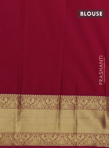 Semi kanchipuram silk saree green and pink with zari woven buttas and long zari woven korvai border