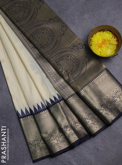 Semi kanchipuram silk saree cream and navy blue with allover small zari checks & buttas and long zari woven border