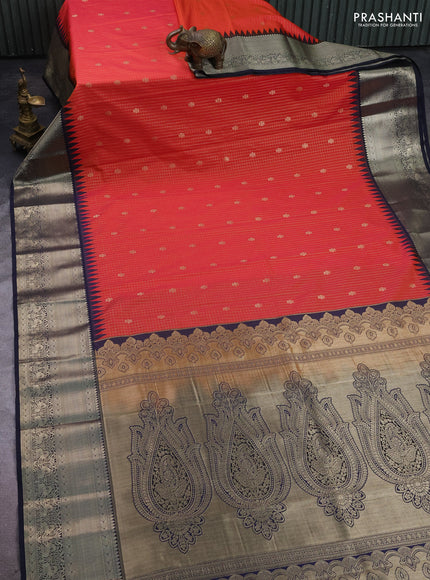 Semi kanchipuram silk saree dual shade of pinkish orange and navy blue with allover small zari checks & buttas and long zari woven border